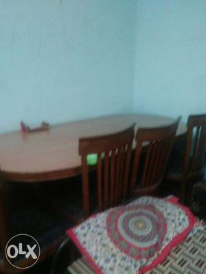 Oval Brown Wooden Table With Chairs Set