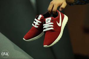 Pair Of Red Nike Sneakers