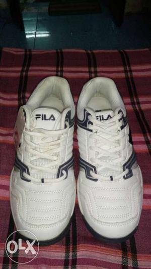 Pair Of White FILA Low-top Sneakers