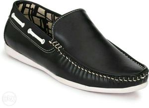 Paired Black Leather Boat Shoe