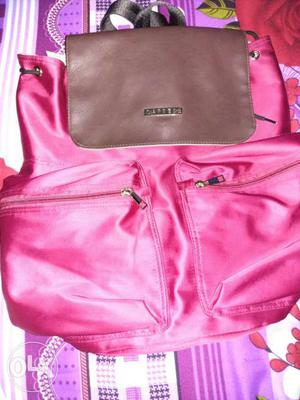 Pink And Brown Leather Bucket Backpack