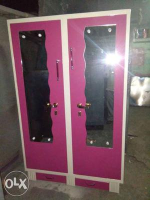 Pink And White Wooden Wardrobe With Mirror