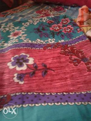 Red, Blue, Purple And White Floral Print Textile