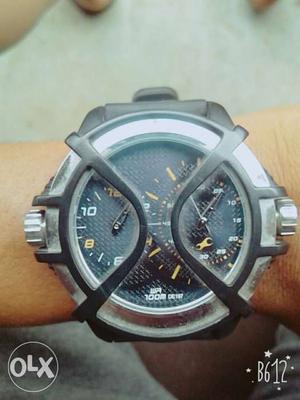 Round Black Faced Chronograph Watch With Black Strap