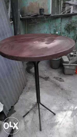 Round Brown Pedestal Patio Table