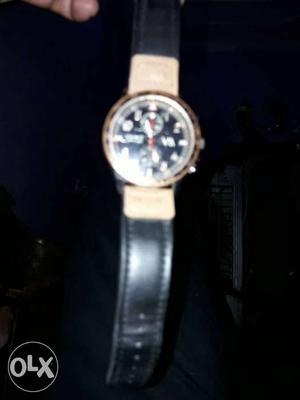 Round Gold And Black Chronograph Watch With Leather Band