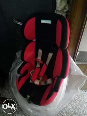 Toddler's Black And Red Booster Chair