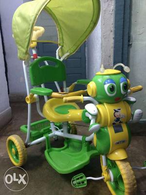 Toddler's Yellow And Green Trike With Umbrella six month