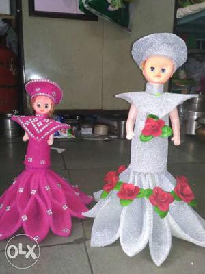 Two Woman In White And Pink Dress Doll