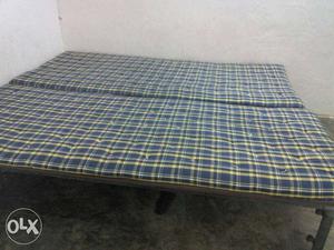 Two Yellow And Blue Plaid Tufted Mattress (gadde)