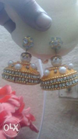 Two Yellow Jhumka Earrings