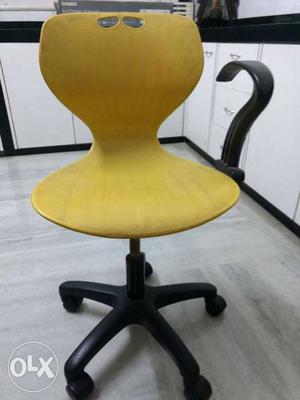 Yellow And Black Rolling Chair