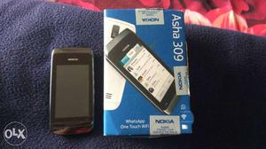 Asha 309 with box. No charger. Phone is off so