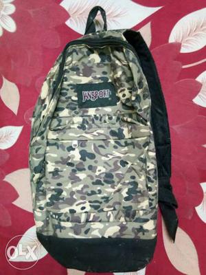 Black, Brown, Gray, And Green JanSport Backpack