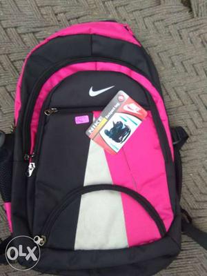 Black, Pink And White Nike Backpack