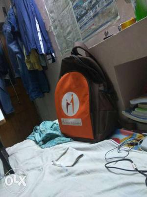 Brown And Orange Backpack