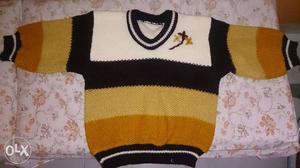 Knit White, Black, Yellow, And Brown Sweater