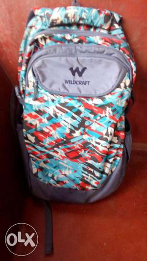 Red, White, Gray, And Black Wildcraft Backpack