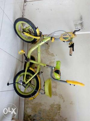 Toddler's Green And Yellow BMX cycle
