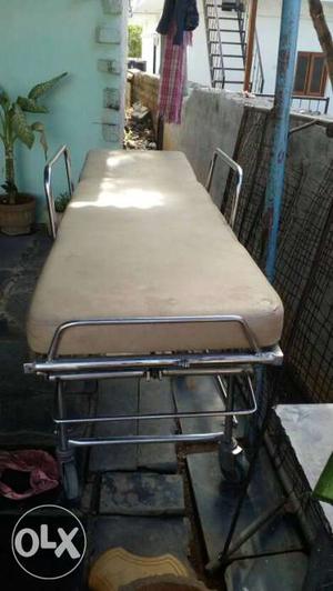 Beige And Silver Stretcher