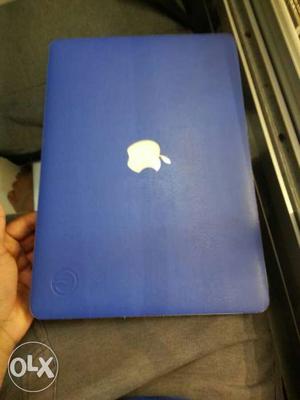 MacBook Air with charger n blue leather back