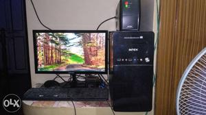 Black Flat Screen Computer Monitor With Keyboard, Mouse And