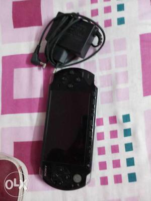 Black Sony PSP With Accessories (3-4 years old).
