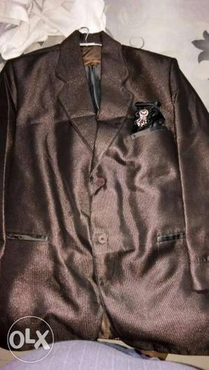 Brown coloured 3piece blazer with tie