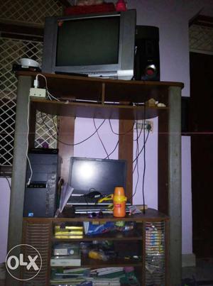 Gray CRT Television On Brown And Gray Wooden Stand