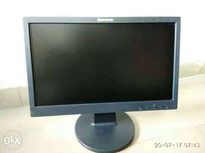 Gray Lenovo Flat Screen Computer Monitor