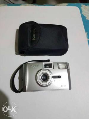 Silver-colored Kodak Point And Shoot Camera