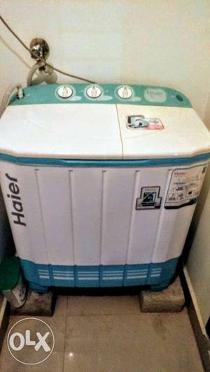 White And Blue Haier Portable Washer And Dryer Set