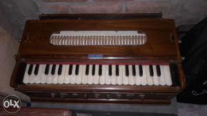 Almost new 7 reed harmonium... branded wood..with
