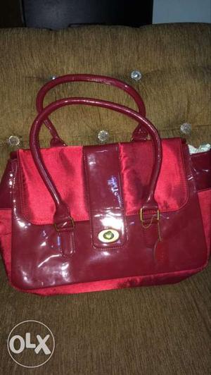 BRAND NEW maroon hand held bag just for Rs 400/-