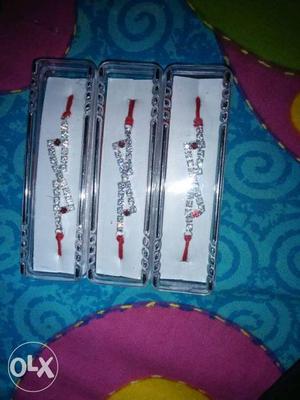 Beautiful collection of Three Silver rakhis