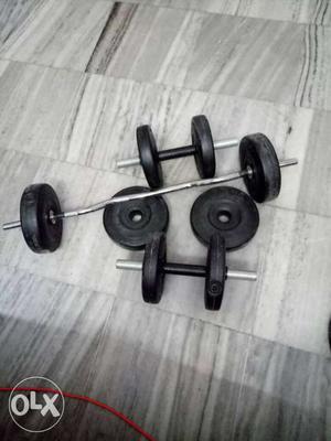 Black Barbell And Two Dumbbells