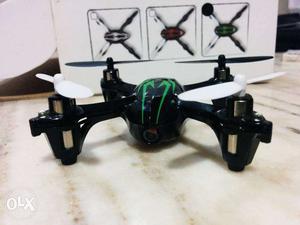 Black, Green, And White Drone
