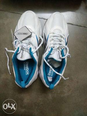 Blue-and-white Reebok Running Shoes