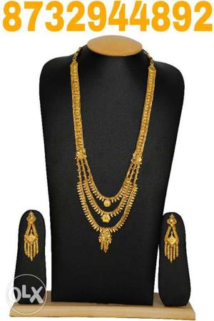 Gold Layered Necklace And Pair Of Chandelier Earrings Set