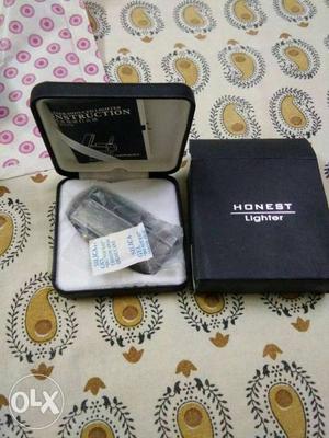 Gray Honest Lighter With User's Manual In Box