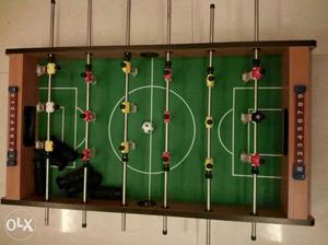 Green And Brown Foosball Table