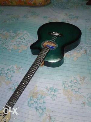 Green Cutaway Guitar