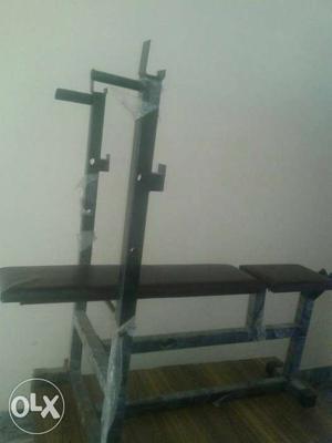 Gym dumbles and machine newely only 1 month old with 2 rods