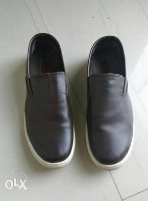 Pair Of Brown Leather Slip On Shoes