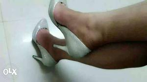 Pair Of Gray Pointed Toe Stiletto Heel Shoes