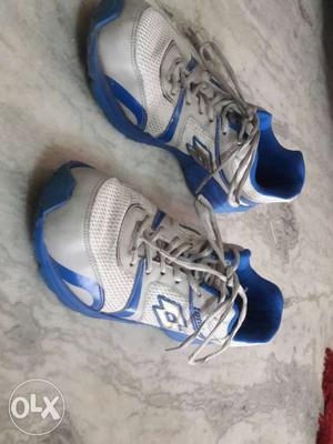 Pair Of Gray-white-and-blue Lotto Running Shoes