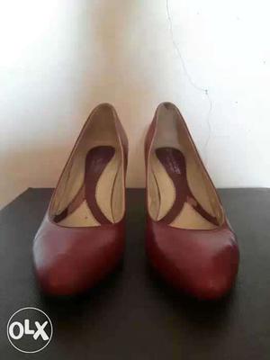 Pair Of Red Leather Heeled Shoes
