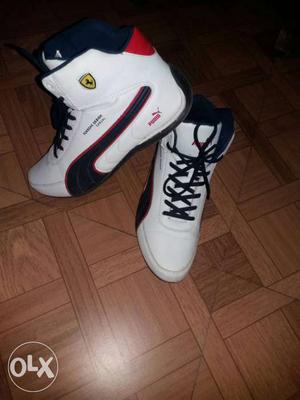 Pair Of White-black-and-red Basketball Shoes