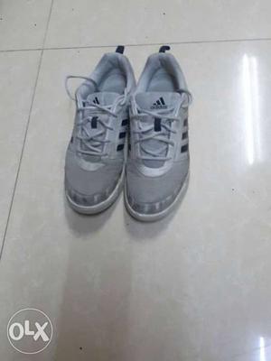 Pair Of white and Grey Adidas sports shoes in nice condition