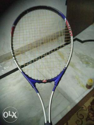Purple And Gray Tennis Racket